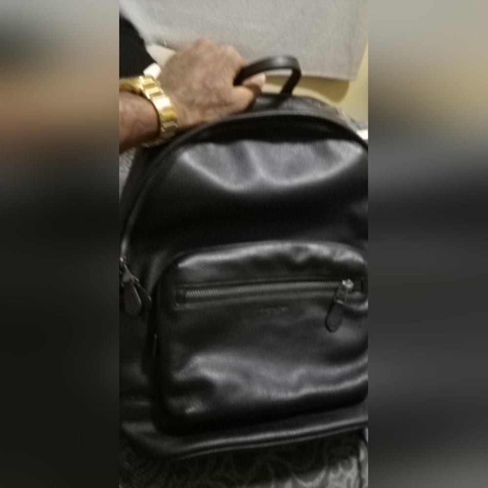 Black leather Coach book bag